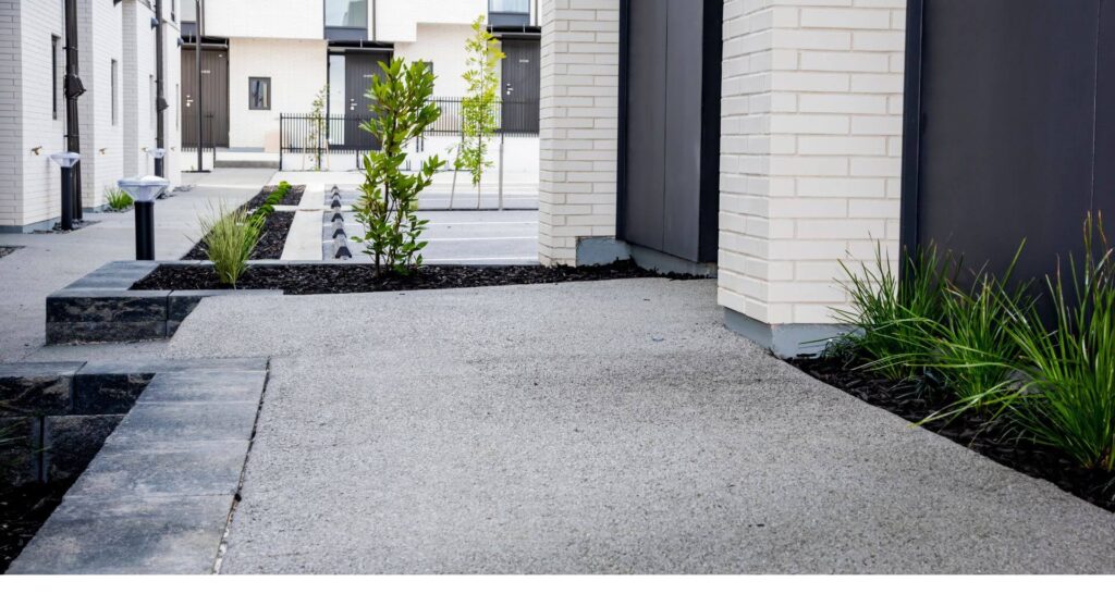 Permeable footpath in Auckland - filters water to ground, protects drains and nearby landscaping.